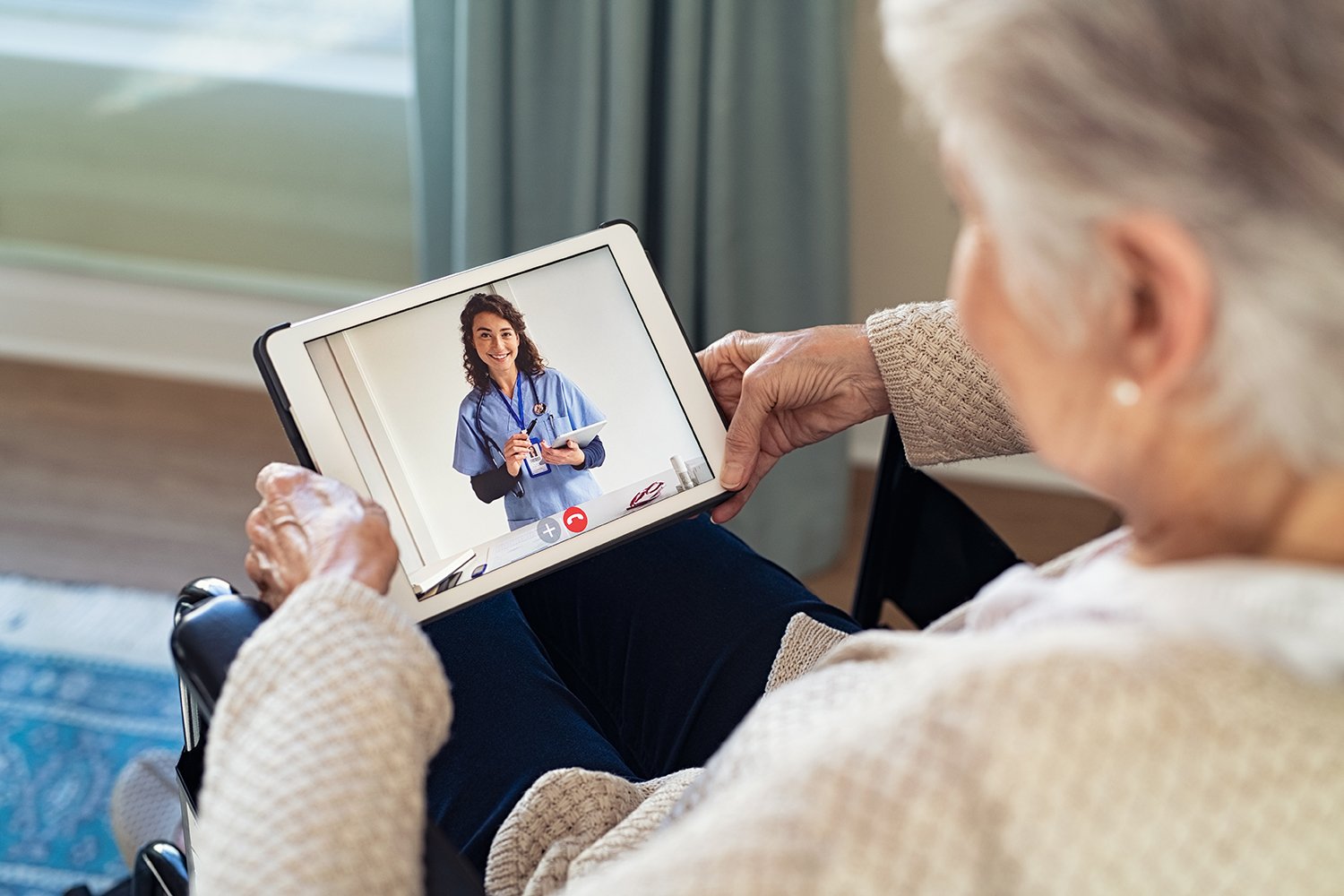 woman with tablet virtual care